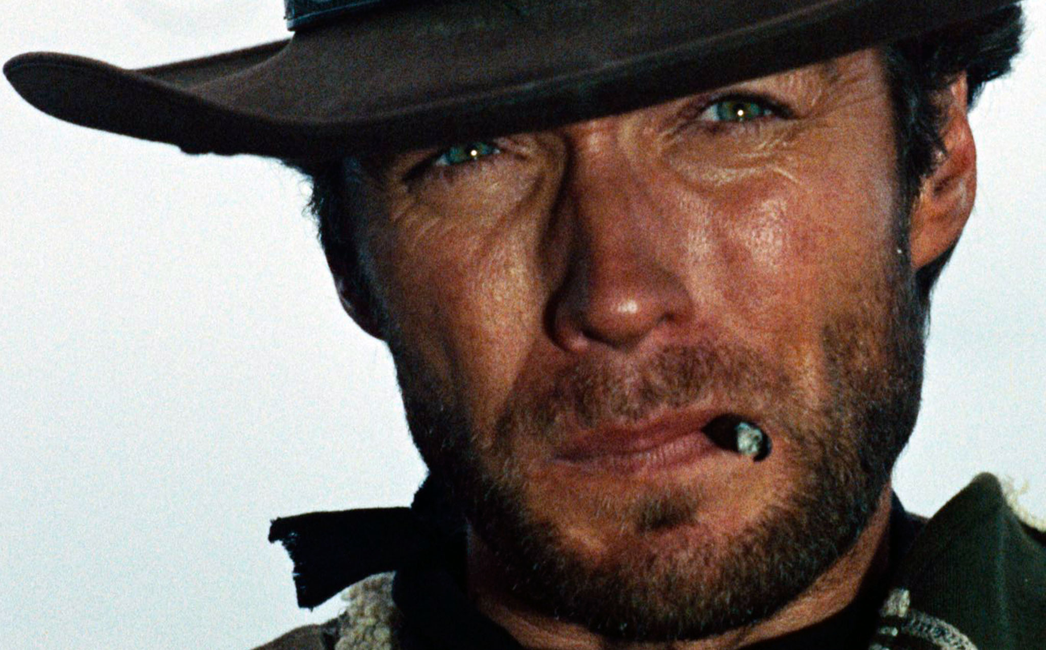 Фото лица ковбоя. Клинт Иствуд ковбой. Клинт Иствуд долларовая трилогия. Клинт Иствуд 2022. Клинт Иствуд ковбой с сигарой.
