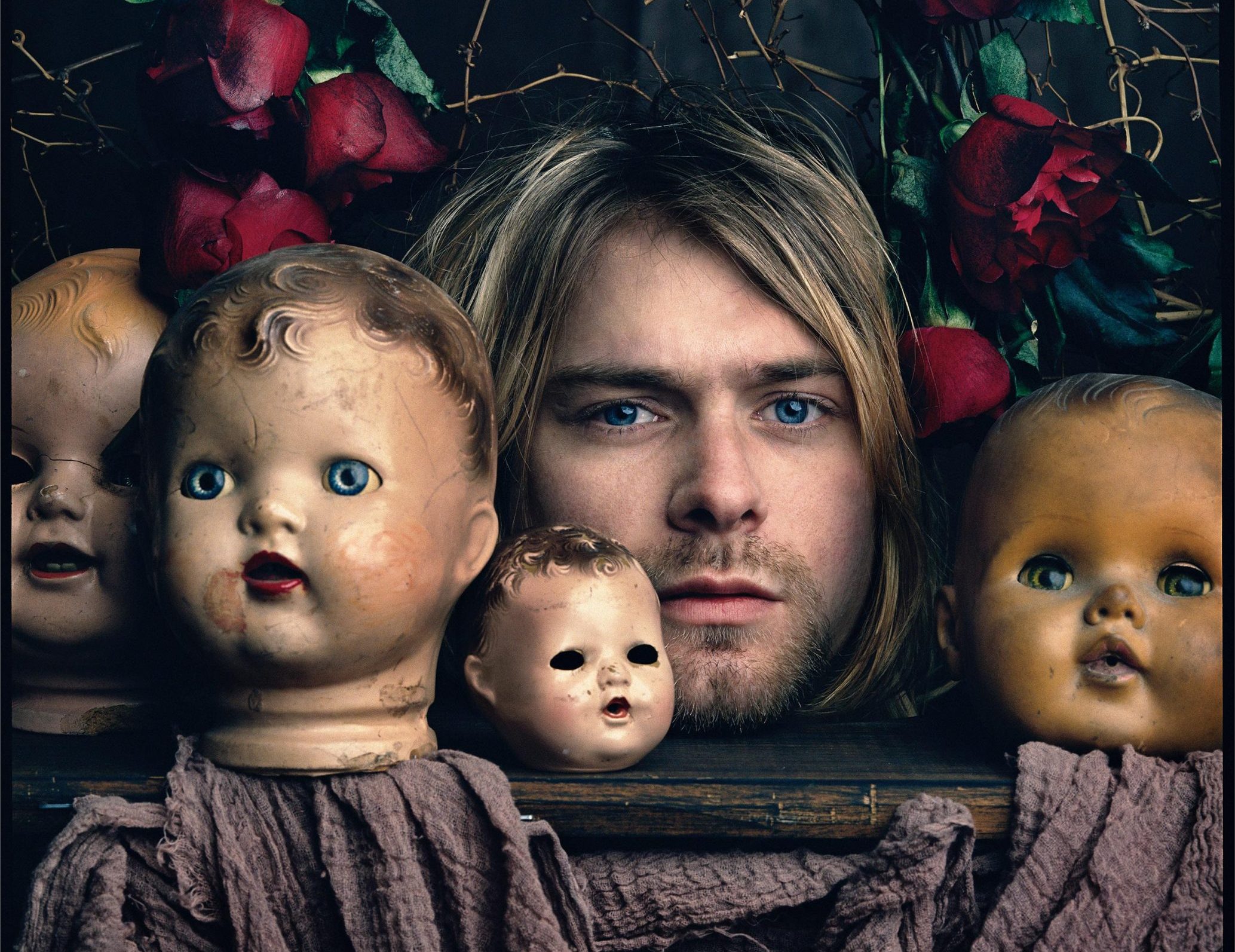 La historia de la icónica foto de Kurt Cobain con cabezas de muñecas ...