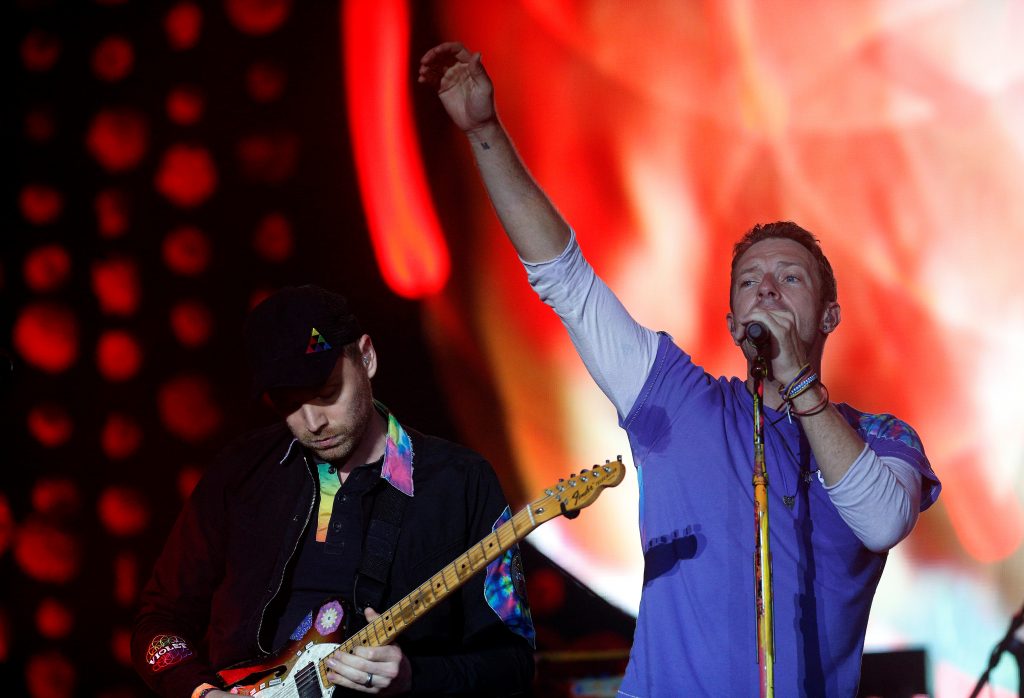 Coldplay Perform On The Pyramid Stage At Worthy Farm In Somerset During The Glastonbury Festival
