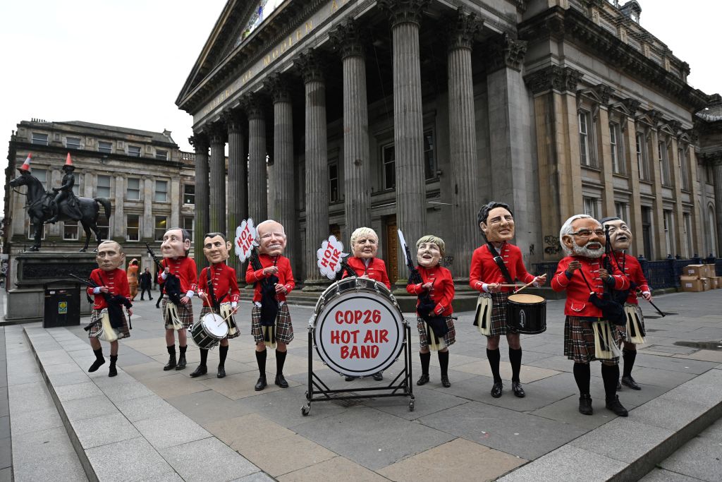 TOPSHOT BRITAIN UN CLIMATE COP26 OXFAM DEMO