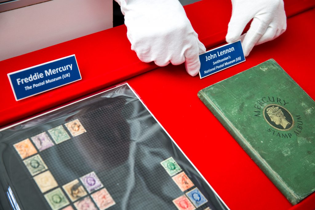 The Postal Museum Puts Freddie Mercury And John Lennon Stamp Albums On Display Together For The First Time