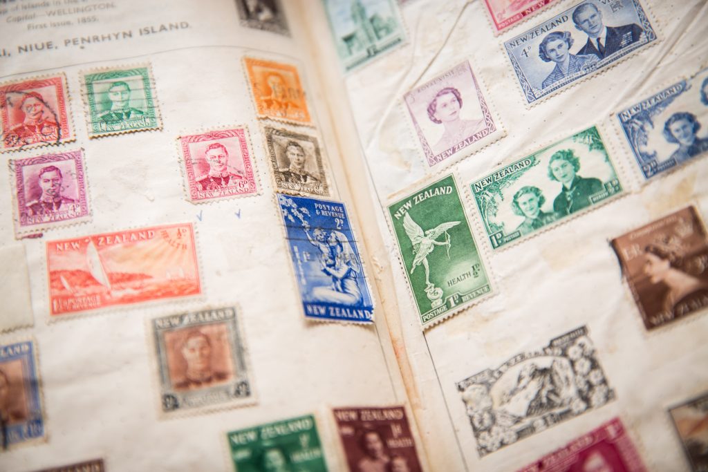 The Postal Museum Puts Freddie Mercury And John Lennon Stamp Albums On Display Together For The First Time