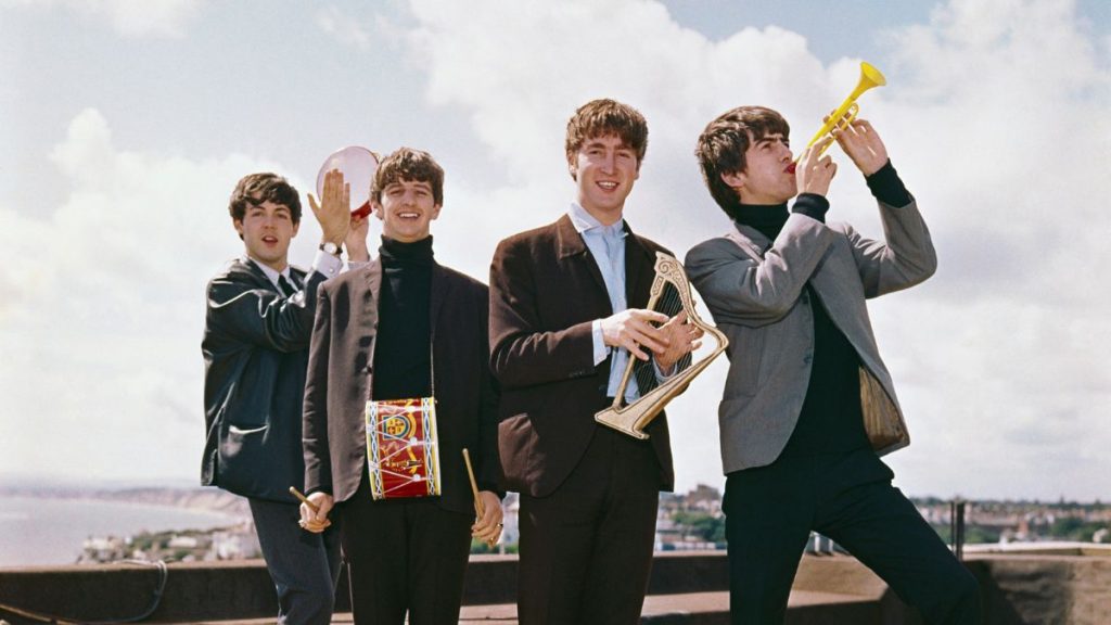 The Beatles mil millones