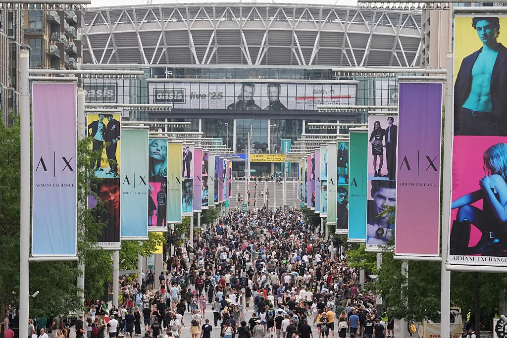 Fans de Oasis en el Wembley Stadium. Foto: Getty Images.