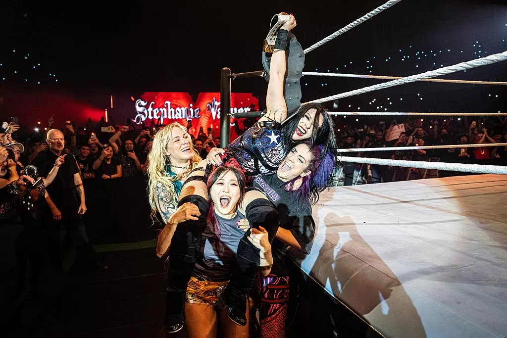 SANTIAGO, CHILE - SEPTEMBER 12: Stephanie Vaquer celebrates winning the Women's World Championship with Sol Ruca, IYO Sky, and Bayley during WWE South America Live Tour at Movistar Arena on September 12, 2026 in Santiago, Chile(Photo by Georgiana Dallas/WWE via Getty Images)